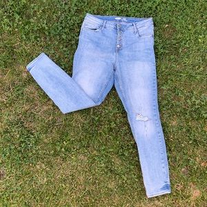 Light wash button rockstar skinny high rise jeans